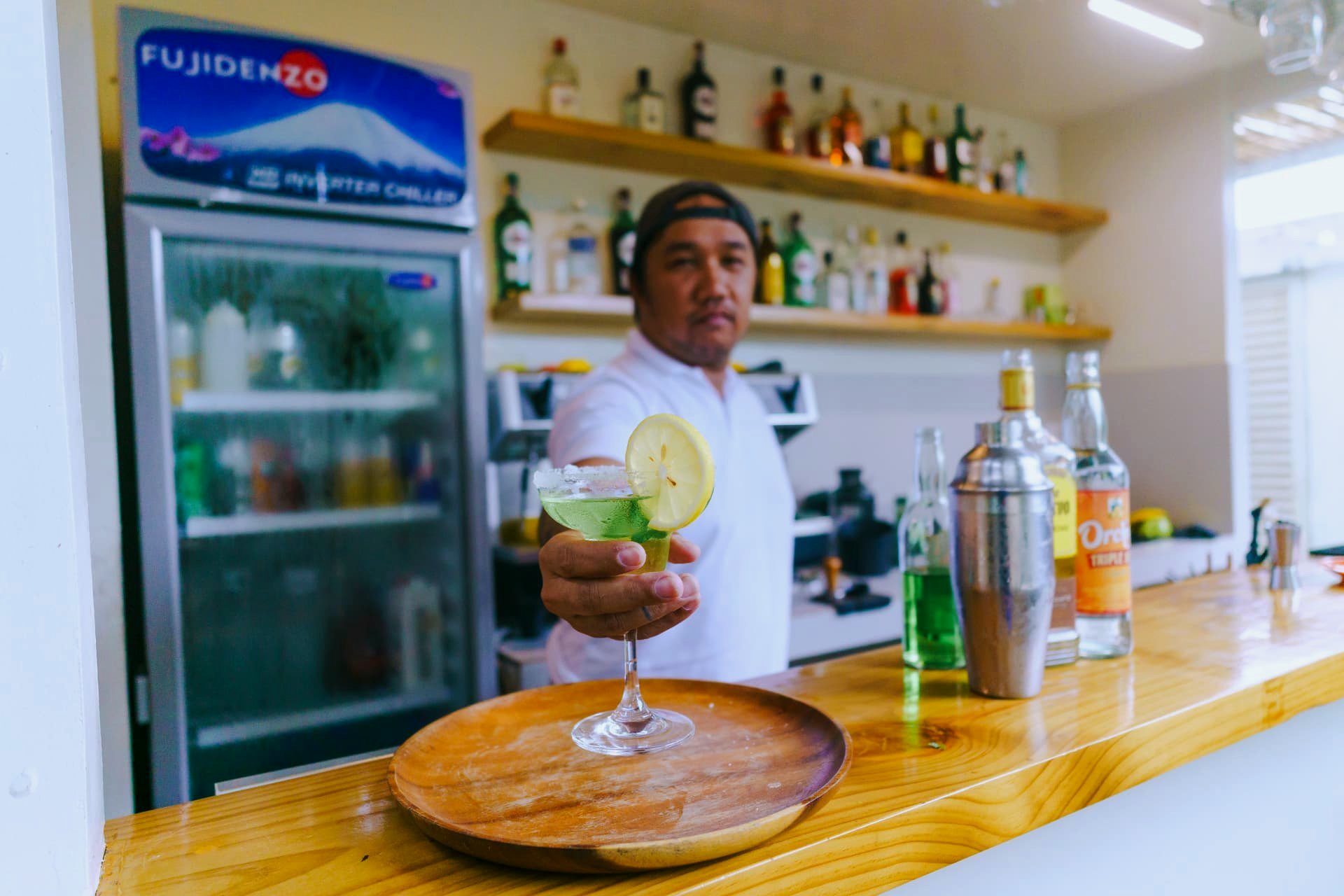 Bartender serving a fresh cocktail at the Namal bar