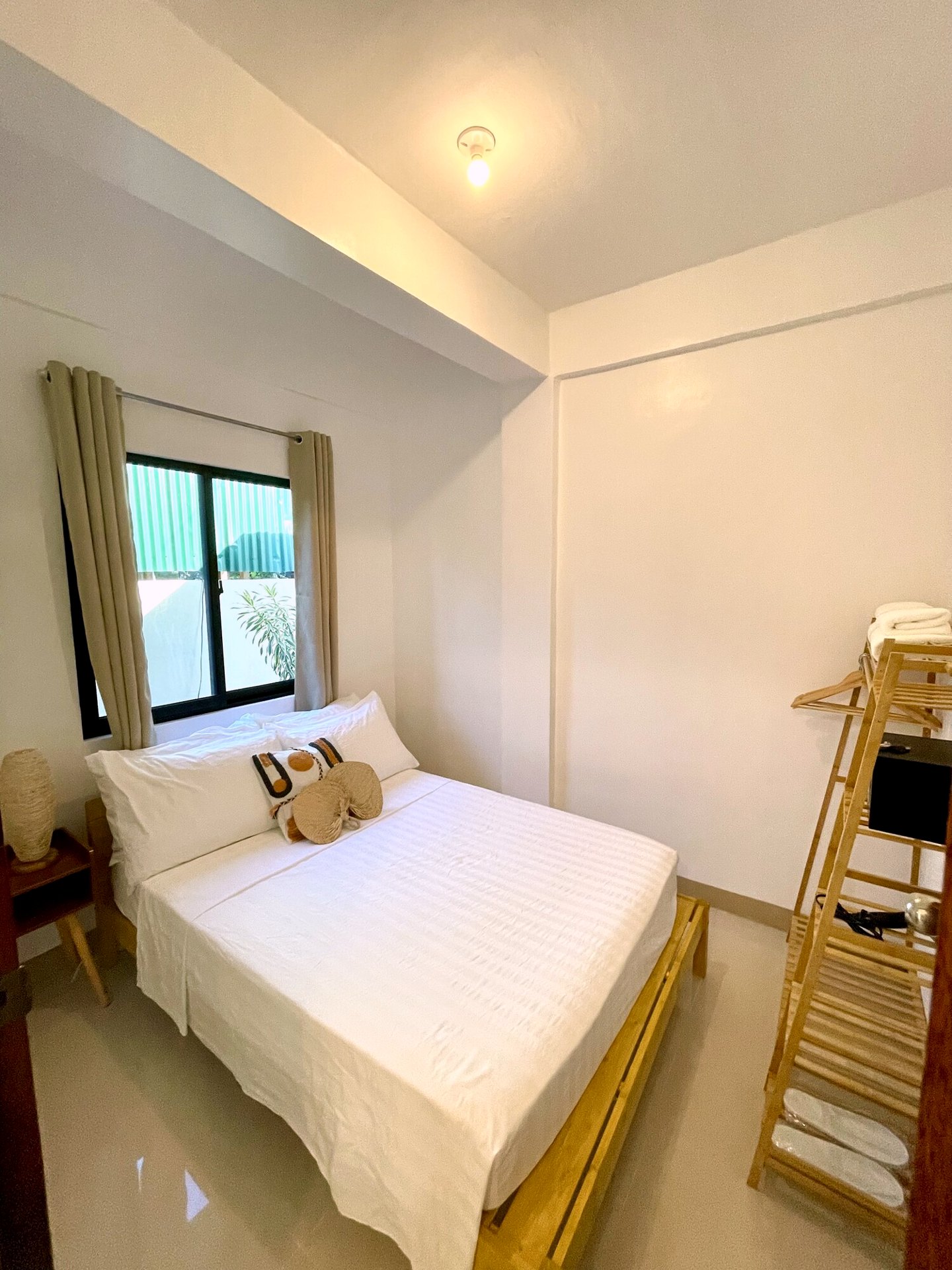 The bedroom at Namal Apartelle